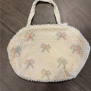 Cream Beaded Bow Accent Wristlet - Unbranded